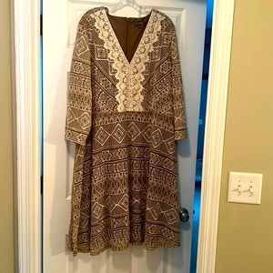 Brand new with tags, brown dress with white geometric patterns.